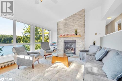 1018C Leisure Ln, Cloyne, ON - Indoor Photo Showing Living Room With Fireplace