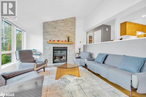 1018C Leisure Ln, Cloyne, ON - Indoor Photo Showing Living Room With Fireplace