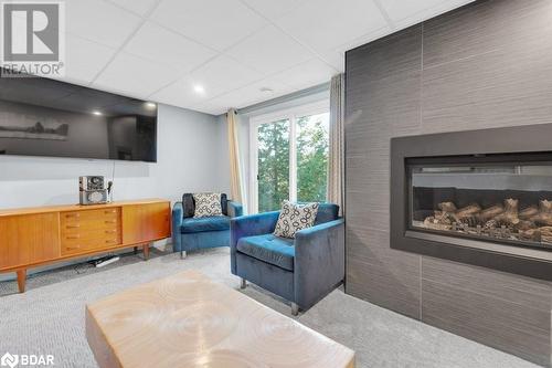 1018C Leisure Ln, Cloyne, ON - Indoor Photo Showing Living Room With Fireplace