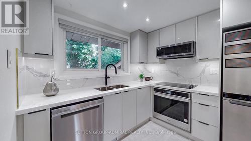 23 Quincy Crescent, Toronto, ON - Indoor Photo Showing Kitchen With Double Sink With Upgraded Kitchen