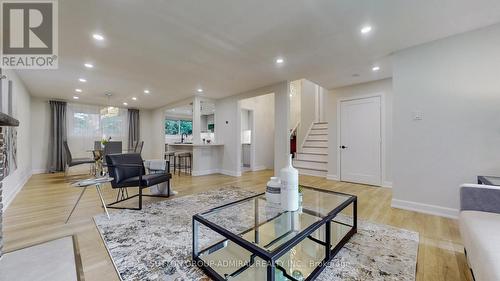 23 Quincy Crescent, Toronto, ON - Indoor Photo Showing Living Room With Fireplace