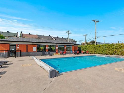 Pool - 107-3735 Av. Jean-Béraud, Laval (Chomedey), QC - Outdoor With In Ground Pool