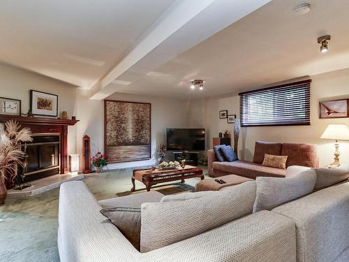 Family room - 4600 Rue L'Écuyer, Laval (Chomedey), QC - Indoor Photo Showing Living Room With Fireplace