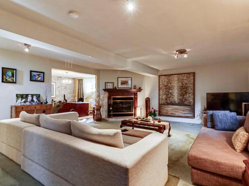 Family room - 4600 Rue L'Écuyer, Laval (Chomedey), QC - Indoor Photo Showing Living Room With Fireplace