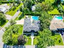 Vue d'ensemble - 218 Rue Oakridge, Baie-D'Urfé, QC  - Outdoor With In Ground Pool 