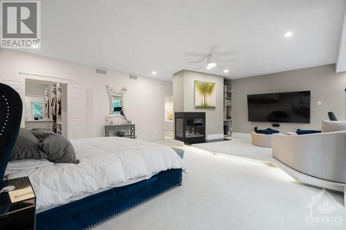 11 Chase Court, Ottawa, ON - Indoor Photo Showing Bedroom With Fireplace