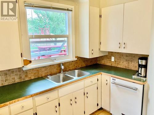 270 Dominion Street, Midway, BC - Indoor Photo Showing Kitchen With Double Sink