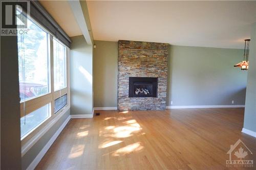 5 Whitburn Crescent, Ottawa, ON - Indoor Photo Showing Living Room With Fireplace