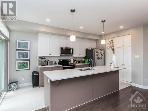 4945 Abbott Street E, Ottawa, ON - Indoor Photo Showing Kitchen With Double Sink