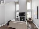 4945 Abbott Street E, Ottawa, ON  - Indoor Photo Showing Living Room With Fireplace 