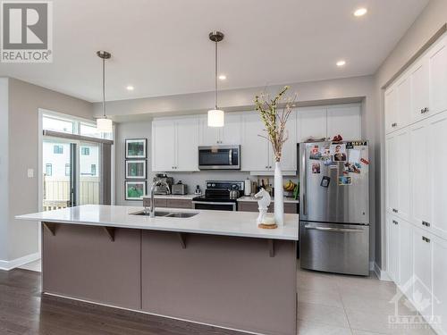 4945 Abbott Street E, Ottawa, ON - Indoor Photo Showing Kitchen With Double Sink With Upgraded Kitchen