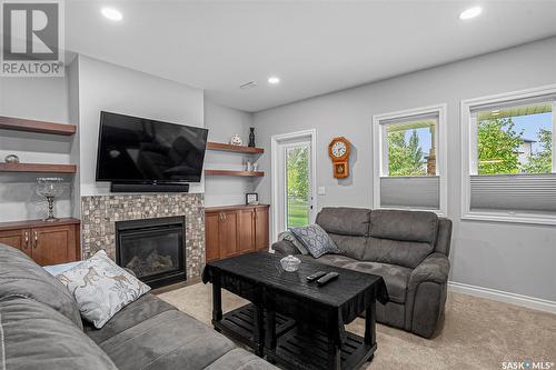 114 342 Trimble Crescent, Saskatoon, SK - Indoor Photo Showing Living Room With Fireplace