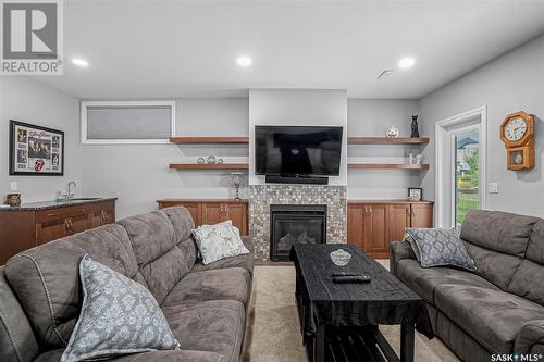 114 342 Trimble Crescent, Saskatoon, SK - Indoor Photo Showing Living Room With Fireplace