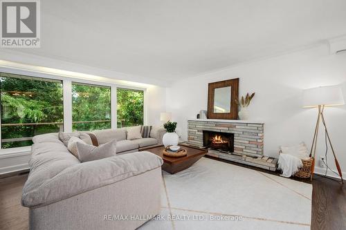 71 Riverwood Parkway, Toronto, ON - Indoor Photo Showing Living Room With Fireplace