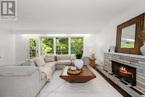 71 Riverwood Parkway, Toronto, ON - Indoor Photo Showing Living Room With Fireplace