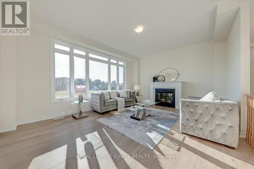 40 Golden Meadows Drive, Otonabee-South Monaghan, ON - Indoor Photo Showing Living Room With Fireplace