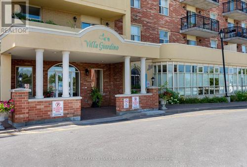 321 - 7373 Martingrove Road, Vaughan, ON - Outdoor With Balcony With Facade