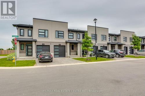 38 - 3380 Singleton Avenue, London, ON - Outdoor With Facade