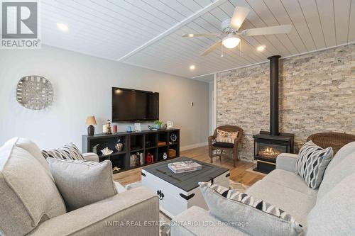 11 - 5 River Road, Lambton Shores (Grand Bend), ON - Indoor Photo Showing Living Room With Fireplace