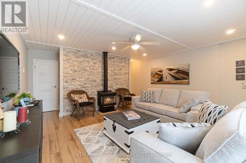 11 - 5 River Road, Lambton Shores (Grand Bend), ON - Indoor Photo Showing Living Room With Fireplace