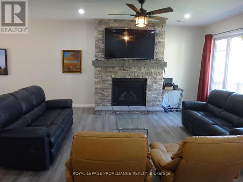 13 Crawford Drive, Marmora And Lake, ON - Indoor Photo Showing Living Room With Fireplace