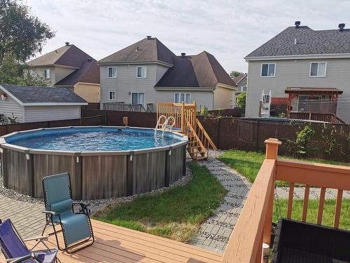 Piscine - 2040 Rue De Bordeaux, Vaudreuil-Dorion, QC - Outdoor With Above Ground Pool With Deck Patio Veranda With Exterior