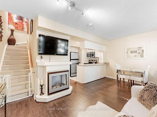 637-3 Everson Dr, Toronto, ON - Indoor Photo Showing Living Room With Fireplace