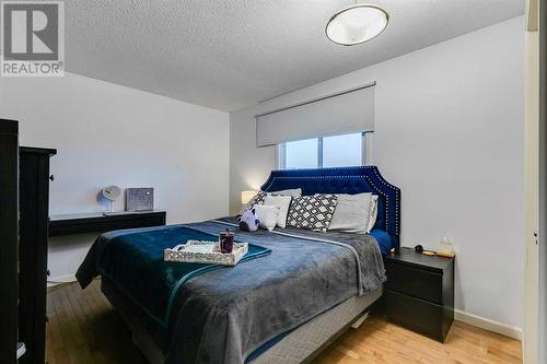 12112 Canfield Road Sw, Calgary, AB - Indoor Photo Showing Bedroom