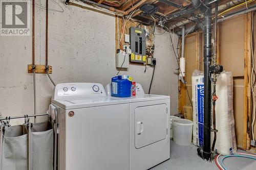 12112 Canfield Road Sw, Calgary, AB - Indoor Photo Showing Laundry Room