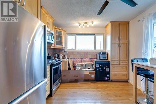 12112 Canfield Road Sw, Calgary, AB - Indoor Photo Showing Kitchen