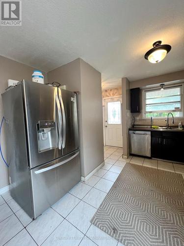 1046 Jalna Blvd Boulevard, London, ON - Indoor Photo Showing Kitchen With Double Sink