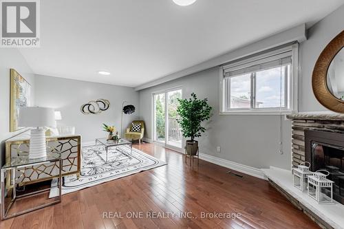 22 Sepia Drive, Toronto, ON - Indoor Photo Showing Living Room With Fireplace