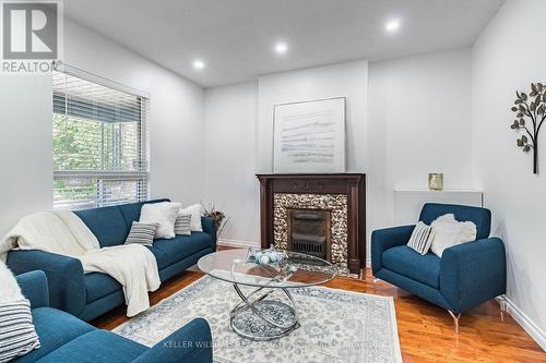 25 Boustead Avenue, Toronto, ON - Indoor Photo Showing Living Room With Fireplace