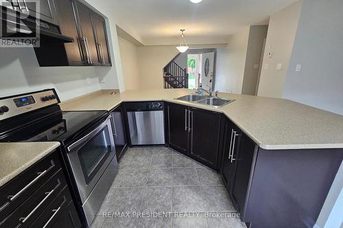 1008 Timmer Place, Milton, ON - Indoor Photo Showing Kitchen With Double Sink