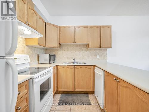 19 - 38 Gibson Avenue, Toronto, ON - Indoor Photo Showing Kitchen With Double Sink