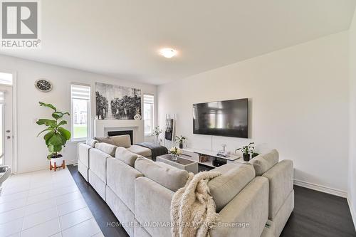 1237 Muskoka Heights, Milton, ON - Indoor Photo Showing Living Room With Fireplace