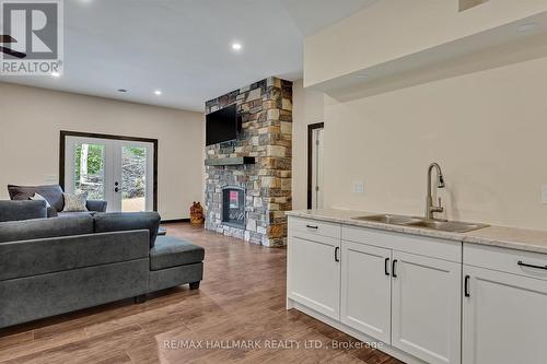 511 Brethour Road, Hastings Highlands, ON - Indoor Photo Showing Living Room With Fireplace