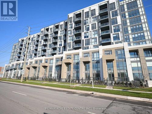 715 - 509 Dundas Street W, Oakville, ON - Outdoor With Facade