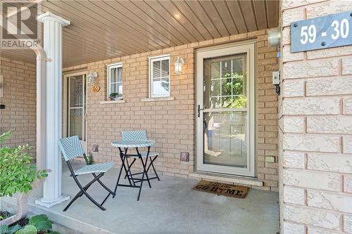 Relax on your front porch - 30 Braemar Avenue Unit# 59, Caledonia, ON - Outdoor With Exterior