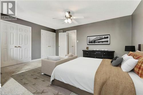 Primary Bedroom virtually staged - 30 Braemar Avenue Unit# 59, Caledonia, ON - Indoor Photo Showing Bedroom