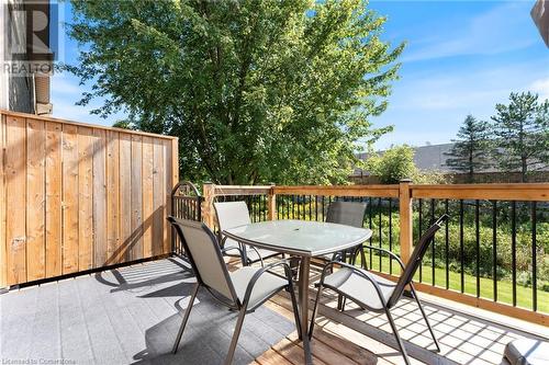 Patio offers privacy from neighbours on either side - 30 Braemar Avenue Unit# 59, Caledonia, ON - Outdoor With Deck Patio Veranda With Exterior