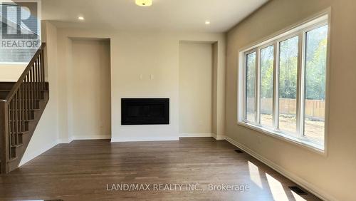 3187 Searidge Street, Severn, ON - Indoor With Fireplace