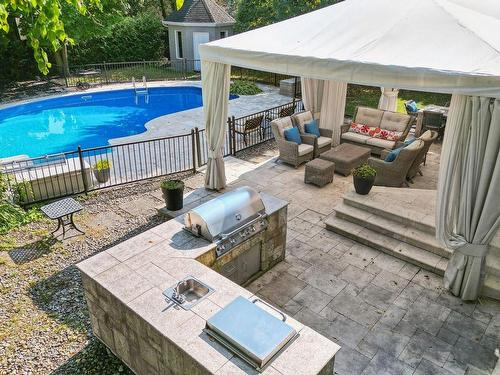 Patio - 612 Rue Du Beaujolais, Rosemère, QC - Outdoor With In Ground Pool