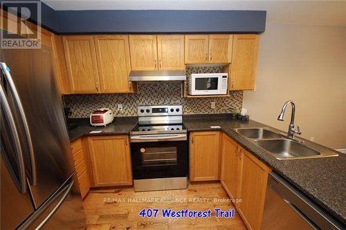 407 Westforest Trail, Kitchener, ON - Indoor Photo Showing Kitchen With Double Sink