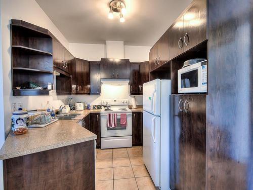 Kitchen - 63-12585 Rue Forsyth, Montréal (Rivière-Des-Prairies/Pointe-Aux-Trembles), QC - Indoor Photo Showing Kitchen