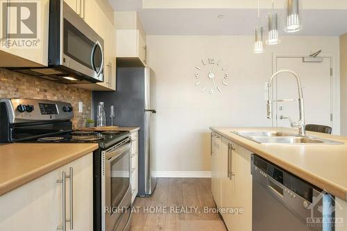 203 - 659 Sue Holloway Drive, Ottawa, ON - Indoor Photo Showing Kitchen With Double Sink