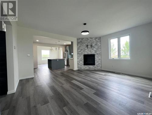 Hilltop Acreage, Swift Current Rm No. 137, SK - Indoor Photo Showing Living Room With Fireplace