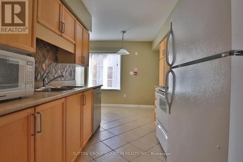 2 - 704 Neighbourhood Circle, Mississauga, ON - Indoor Photo Showing Kitchen With Double Sink