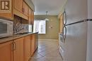 2 - 704 Neighbourhood Circle, Mississauga, ON  - Indoor Photo Showing Kitchen With Double Sink 