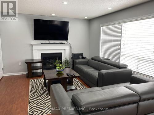 Upper - 16 Tawnie Crescent, Brampton, ON - Indoor Photo Showing Living Room With Fireplace